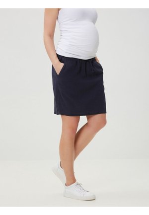 Falda de maternidad azul marino con cintura elástica, cordón y bolsillos laterales. Fabricada en tela suave, de largo hasta la rodilla y con un diseño sencillo.