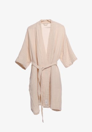 Világos bézs pamut köntös texturált, gyűrt felülettel, széles ujjakkal és elöl megkötős övvel. Nyitott elülső kialakítás két oldalzsebbel.