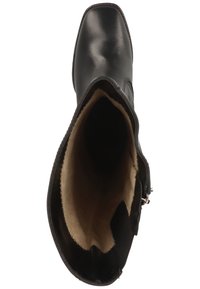 Stivale alla caviglia in pelle nera con punta quadrata, esterno liscia, chiusura con zip laterale e fodera beige visibile dall'apertura.
