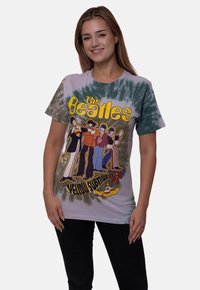 Cotton t-shirt featuring tie-dye pattern in green and gray, with a large The Beatles graphic in yellow and colorful characters from "Yellow Submarine."