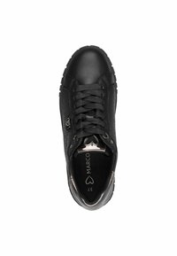 Black sneaker featuring a textured upper, round toe, flat lace closure, and metallic accents. Lightweight sole with visible tread pattern.