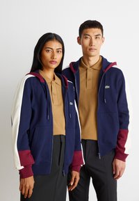 Lacoste ELEVATED COLORBLOCK UNISEX - Mikina so zipsom - navy blue/zin lapland