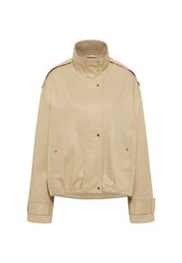 Beige cotton-blend jacket with a high collar, snap button closure, and side pockets. Features adjustable cuffs and a slightly gathered waistband.