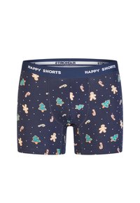 Granatowe bokserki z uroczym wzorem pierników, lasek cukrowych i choinek, ozdobione białymi kropkami oraz wygodnym pasem w talii.