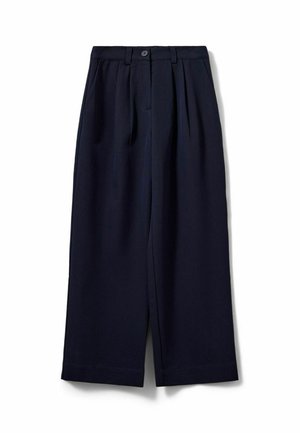 Pantalon large bleu marine foncé avec plis, fermeture par bouton et fermeture éclair, passants pour ceinture et poches latérales, présenté sur fond blanc.