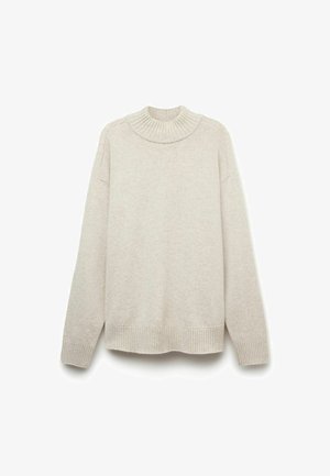 Creme strikket sweater med højt ribbet krave, nedfaldne skuldre samt ribbede manchetter og kant. Blød tekstur med en afslappet pasform.