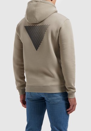 Hooded sweatshirt in light beige with a large black striped triangle design on the back, featuring ribbed cuffs and hem.