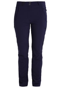 Pantalon slim bleu foncé avec deux poches zippées à l'avant, deux boutons à la taille et un logo sur la partie supérieure de la cuisse gauche.