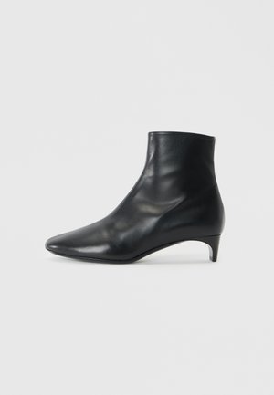 CLAUDE - Ankle boots - black