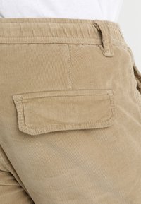 Urban Classics CORDUROY JOG PANTS - Chinos tipa bikses - sand