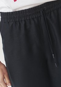 TATUUM PULIO - Broek - navy