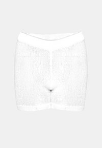 Vita stickade shorts med en tät väv, elastisk midja och en sömlös design vid benöppningarna. Minimalistisk och funktionell stil.