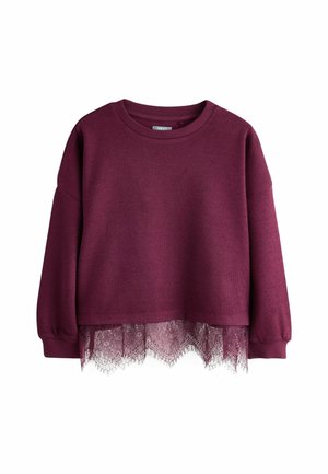 Jersey de manga larga de color púrpura oscuro con puños acanalados y ribete de encaje que se extiende más allá del dobladillo.
