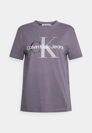 Grijze katoenen t-shirt met een ronde hals, korte mouwen en een bedrukte logo: "Calvin Klein Jeans" en "CK" in contrasterend wit.