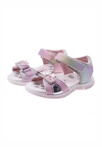 Sandali rosa e glitterati con cinturini regolabili, un accento a forma di cuore e una suola texture. Presentano un dettaglio shiny nero sulla punta.