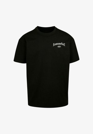 Camiseta de algodón negra con mangas cortas y cuello redondo. Presenta un texto gráfico blanco "Inmortal" en la parte izquierda del pecho.