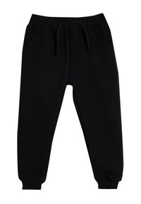 Czarne joggery z prążkowanej tkaniny, z elastycznym paskiem w talii, regulowanym sznurkiem oraz bocznymi kieszeniami. Zwężane nogawki z elastycznymi mankietami u kostek.