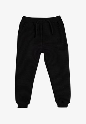 Czarne joggery z prążkowanej tkaniny, z elastycznym paskiem w talii, regulowanym sznurkiem oraz bocznymi kieszeniami. Zwężane nogawki z elastycznymi mankietami u kostek.