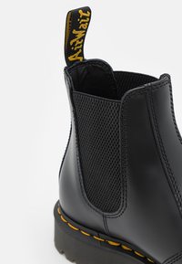 Dr. Martens Kotníkové boty - black