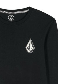 Zwarte lange mouwen t-shirt van katoen, met een grijs logo op de linkerborst en een gestreepte binnenhalsband voor extra detail.