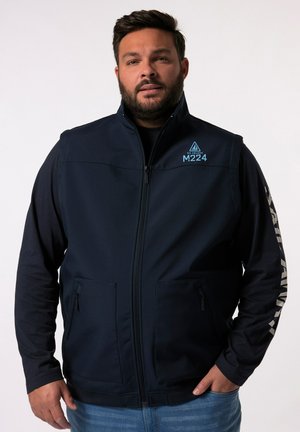 Navy blue vest with a high collar, two zippered front pockets, and a graphic logo on the left chest and sleeve. Soft, textured fabric.