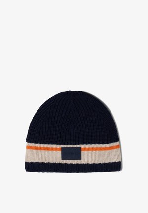 Pletená čepice v námořnické modři s krémovým a oranžovým pruhem na manžetě. Disponuje texturovanou látkou a obdélníkovou značkovou nášivkou.