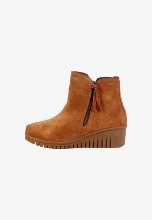 Braune Wildleder-Stiefeletten mit Wedge-Absatz, seitlichem Reißverschluss, strukturiertem Finish und profilierter Gummisohle.
