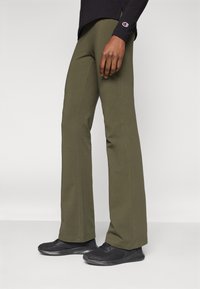 Champion ICONS HIGH WAIST FLARE LEGGINGS - Tamprės - dark green