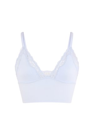 Bralette blanc orné de dentelle avec bretelles réglables et large bande élastique sous la poitrine pour un soutien optimal.