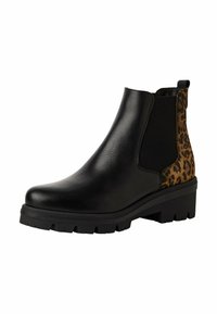 Bottine noire en cuir avec des panneaux latéraux élastiques, des accents en imprimé léopard, une semelle extérieure épaisse noire et un talon légèrement surélevé.