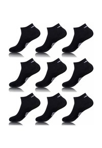 Chaussettes noires pour la cheville, en mélange de coton, avec un logo blanc et des accents géométriques. Huit paires exposées en format grille. Texture lisse.