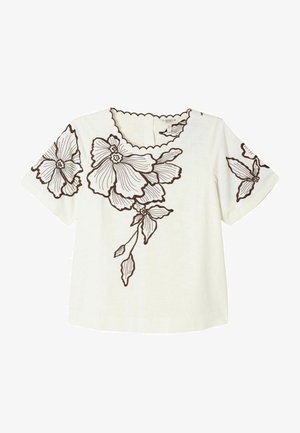 Valge lühikeste varrukatega topp, millel on esiküljel ja varrukatel suured mustad lillekontuurid, laineline kaelus ja sirge äärejoon.