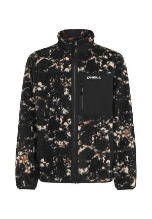 Chaqueta de forro polar negra y crema con un alto cuello, cierre frontal con cremallera y bolsillo en el pecho. Presenta una superficie texturizada y difusa con una mezcla de colores.