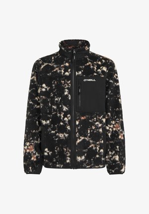 Veste en polaire noire et crème avec un col haut, une fermeture éclair à l'avant et une poche sur la poitrine. Présente une surface texturée et moelleuse avec un mélange de couleurs.