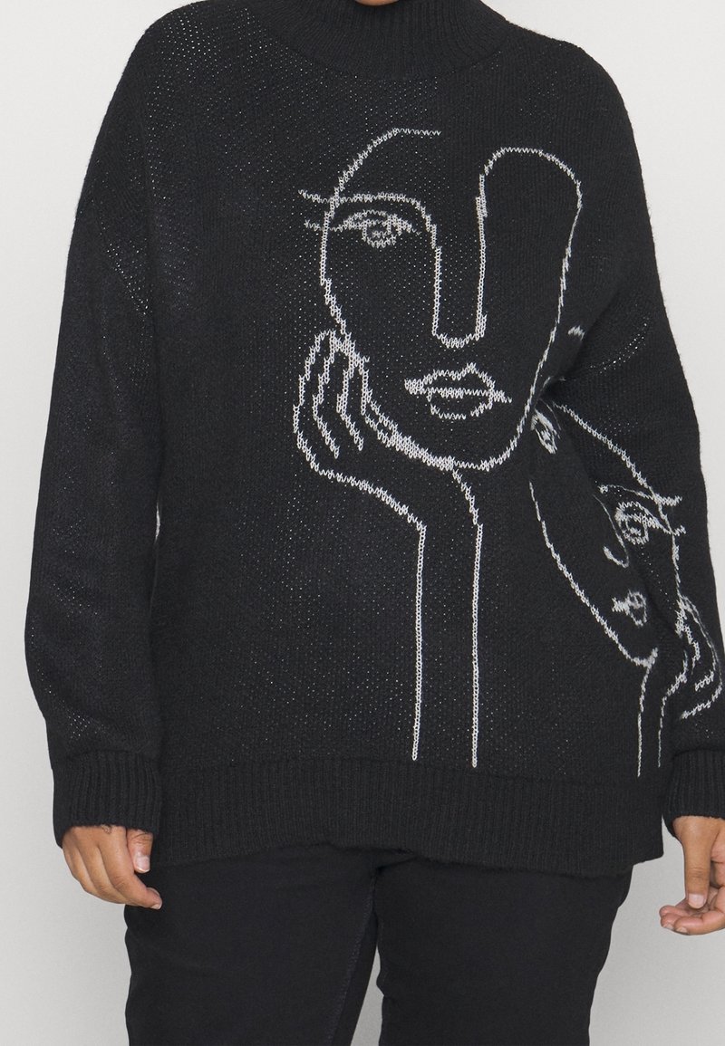 Pull noir en tricot avec un graphique de visage abstrait blanc. Col montant, manches longues et poignets côtelés. Tissu texturé avec une coupe ample.