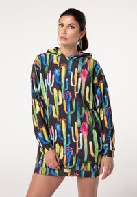 Hooded dress featuring a black background with a colorful cactus pattern. Made of soft fabric, it has long sleeves and a relaxed fit.