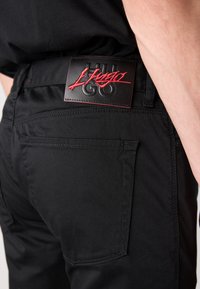 HUGO 734 - Housut - black