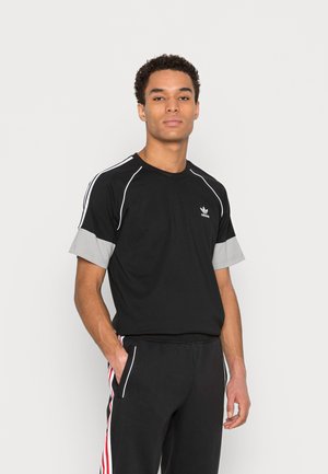 adidas Originals Pantalones deportivos - black/white