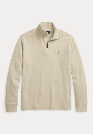 Pull beige à manches longues avec fermeture éclair en quart et petit logo brodé sur la poitrine gauche.