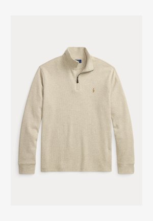 Beige long-sleeve pullover with quarter-zip and small embroidered logo on the left chest.