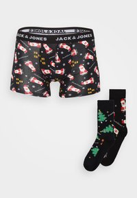 Schwarze Unterwäsche mit Weihnachtsmann-Motiv und festlichen Akzenten; wird mit passenden schwarzen Socken geliefert, die Weihnachtsbaum- und Weihnachtsmann-Designs zeigen.