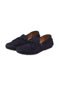 Marineblaue Wildlederslipper mit abgerundeter Spitze, Schnürakzent und Gummisohle. Verfügt über eine Nahtverzierung entlang der Kanten und ein glattes Innenfutter.
