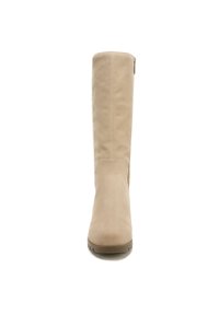 Beige knee-high boot made of suede with a smooth texture, rounded toe, low platform sole, and side zipper detail.