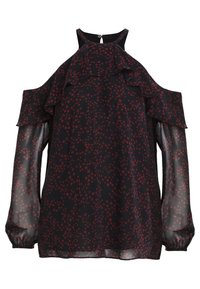 Blouse noire transparente à manches longues avec motif d'étoiles rouges, découpes aux épaules, détail à volants au niveau de l'encolure et fermeture boutonnée au dos.