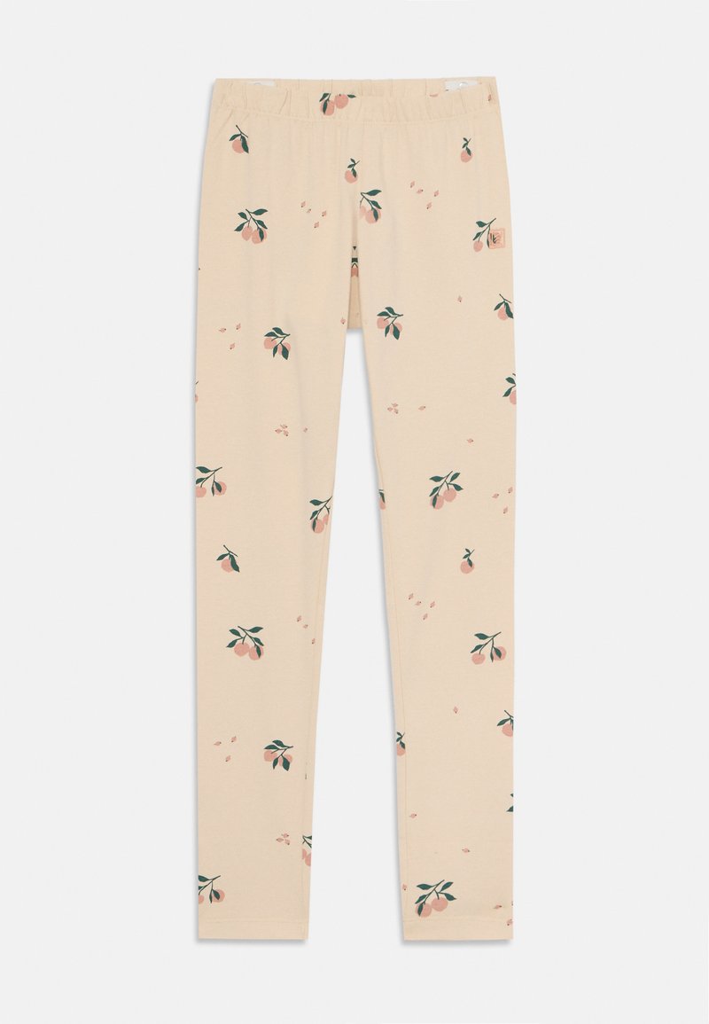 Leggings van zacht beige stof, met een licht perzikkleurig en groen bladenpatroon, uitgerust met een elastische tailleband voor comfort en pasvorm.
