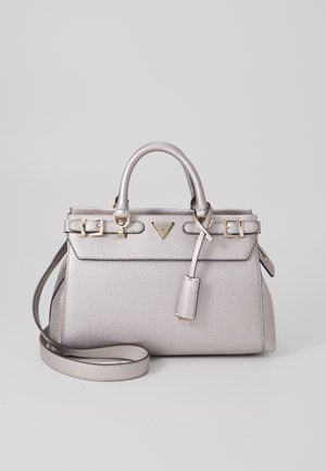 Silver leather handbag with top handles, front buckle details, a hanging tag, and an adjustable shoulder strap on a neutral background.