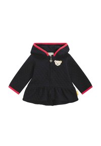 Giacca a vento blu navy con bordi rosa, tessuto texturizzato, chiusura con zip e una patch a forma di orso sul petto; orlo svasato e maniche lunghe.