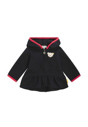 Marineblauer Kapuzenjacke mit pinken Akzenten, strukturiertem Stoff, Reißverschluss und einem Bären-Patch auf der Brust; ausgestellter Saum und lange Ärmel.
