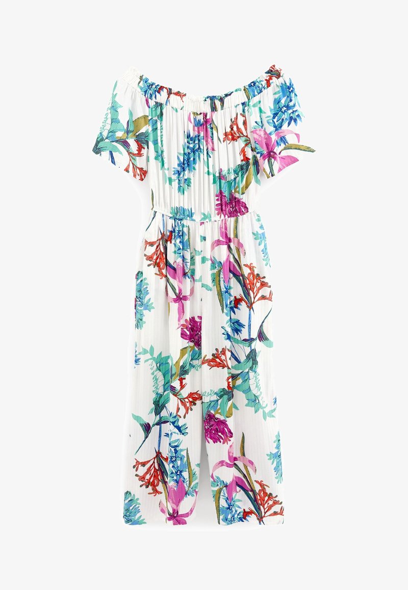 Combinaison fleurie à épaules dénudées en tissu blanc, ornée de motifs colorés de fleurs rouges, violettes et vertes ; design plissé ; encolure élastique.