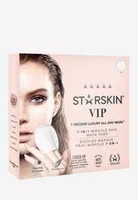 Boîte du masque de luxe Starskin VIP 7 Secondes Tout au Long de la Journée. Emballage rose doux avec une illustration de visage et des détails sur le produit. Comprend des tampons de masque ronds blancs.